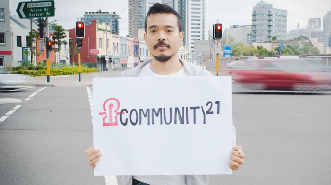 man with sign in intersection