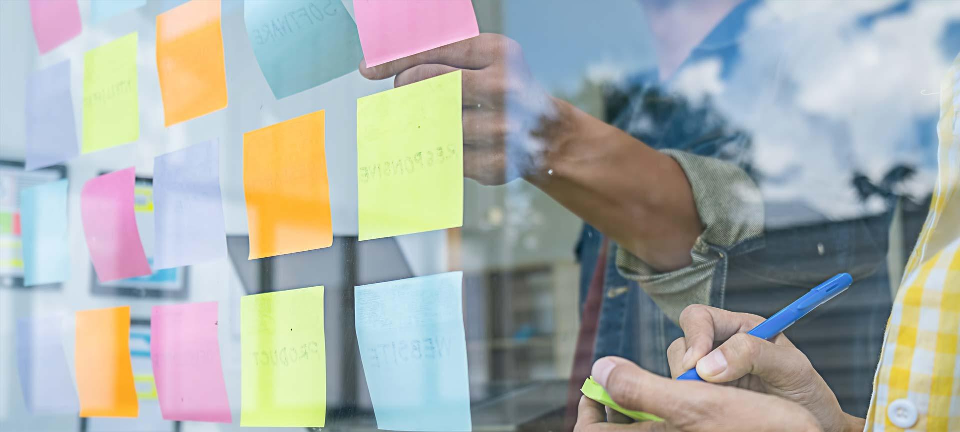 People using post-it notes during a design session