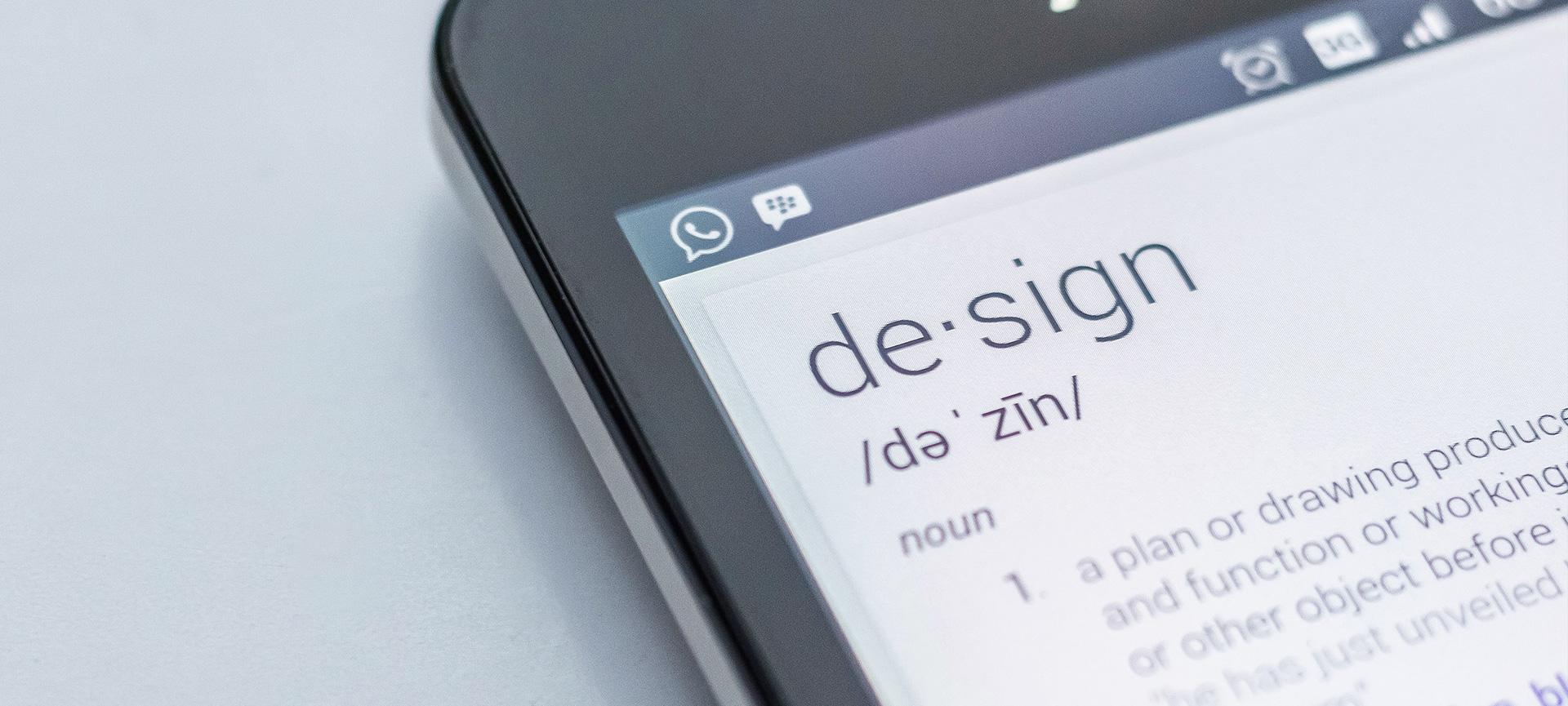 Smart phone with definition of "design" on display