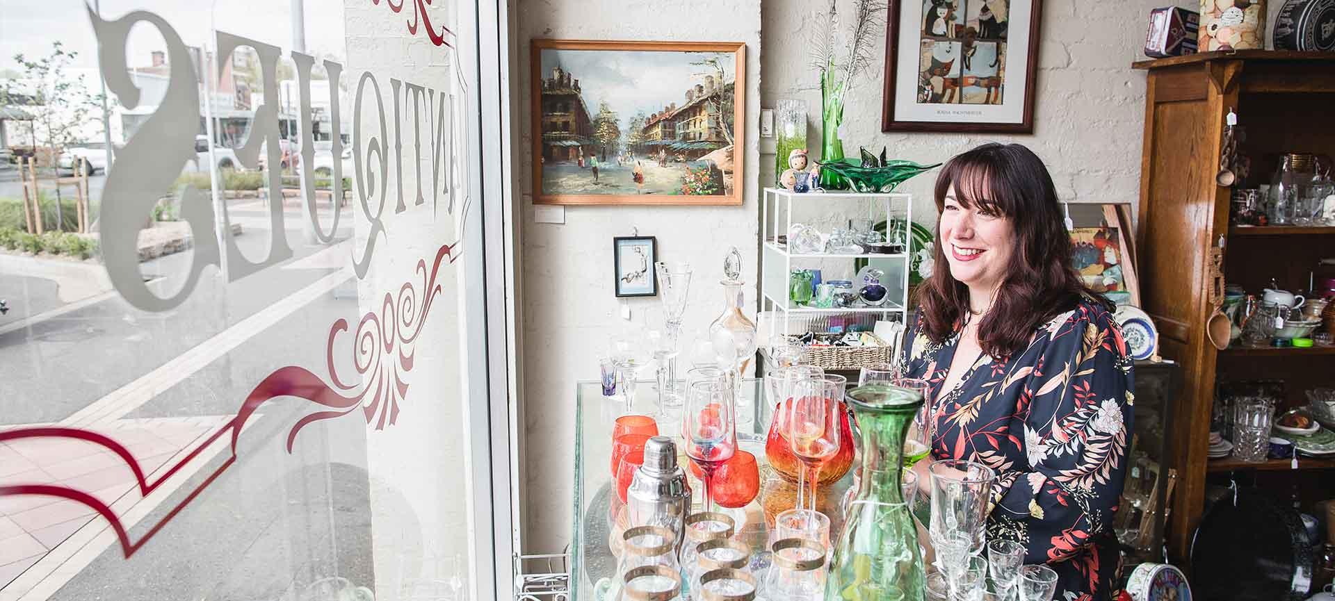 Nina in her mother-in-law's antiques shop