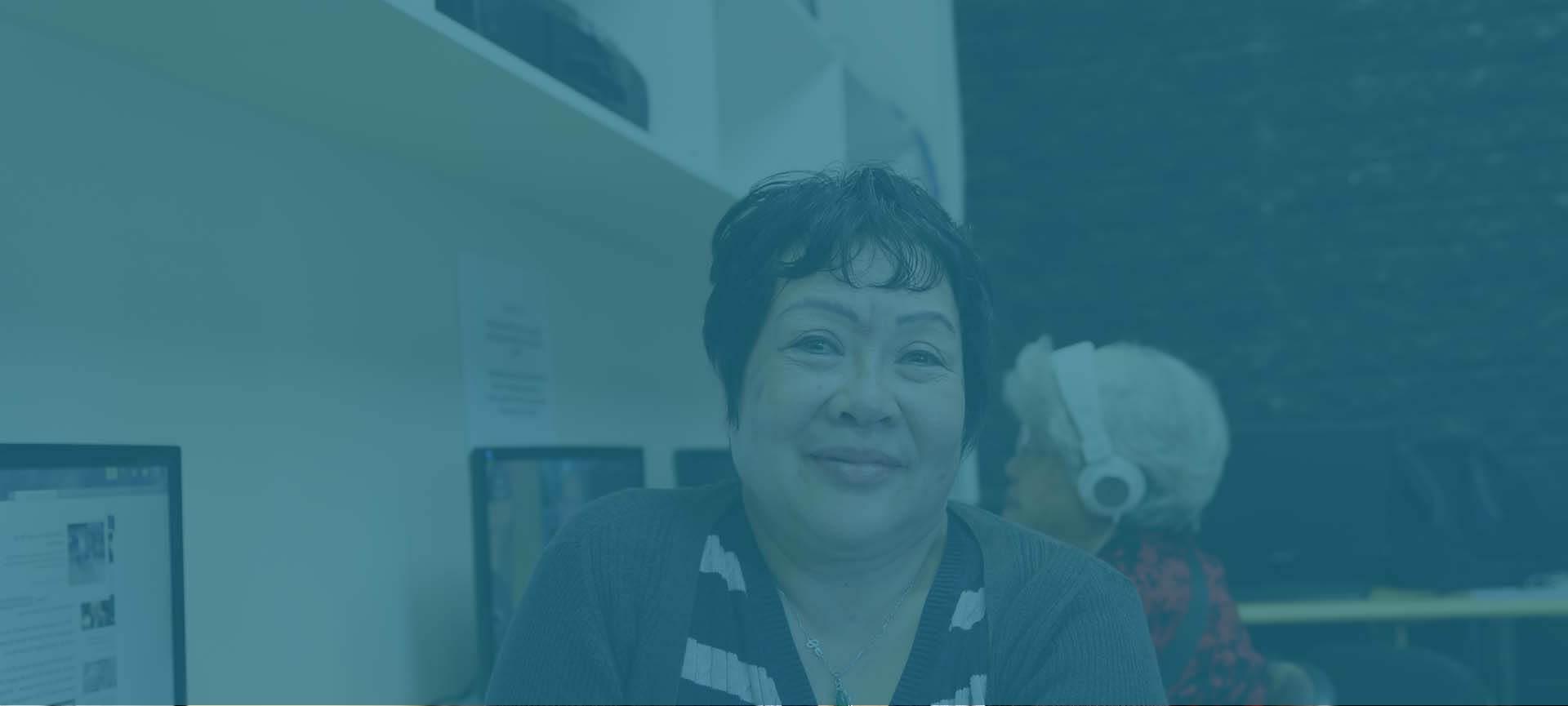 woman_at_computer_looking_at_camera.jpg