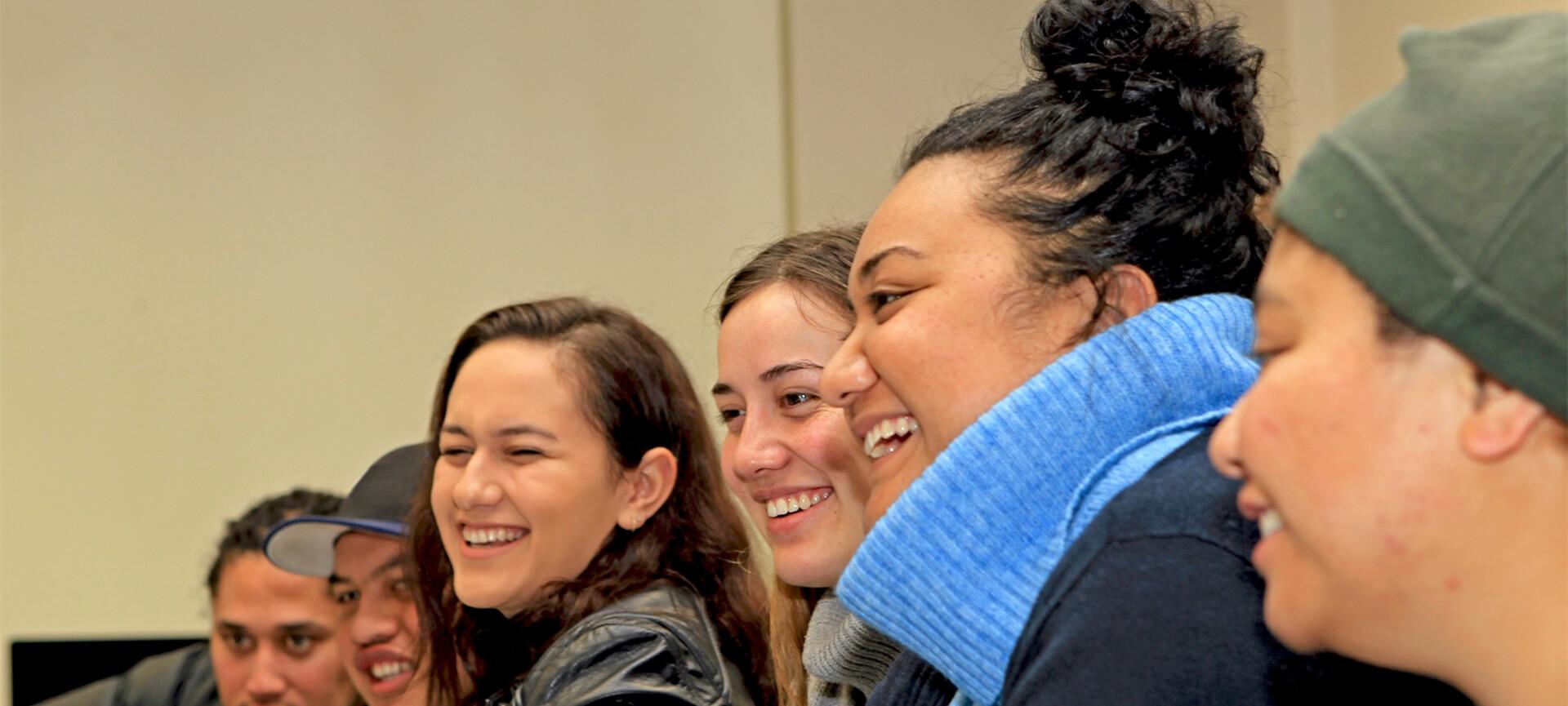 Young Maori people smiling