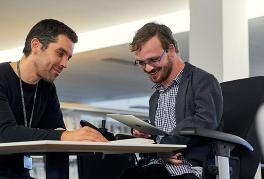 Man with disability using a tablet computer