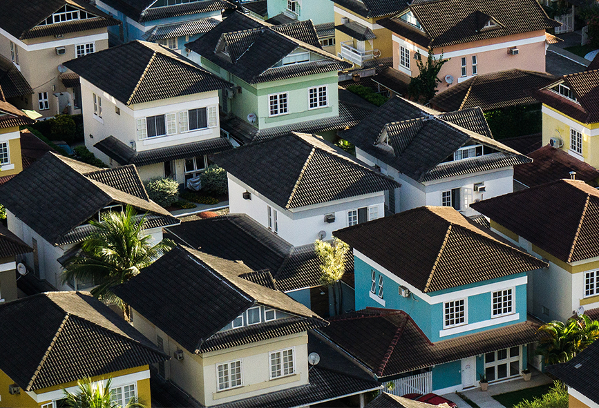 Colourful houses in neat rows from above