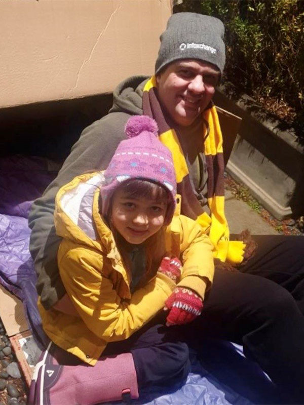 Infoxchange CEO David and his daughter camping on their balcony Infoxchange CEO David and his daughter camping on their balcony