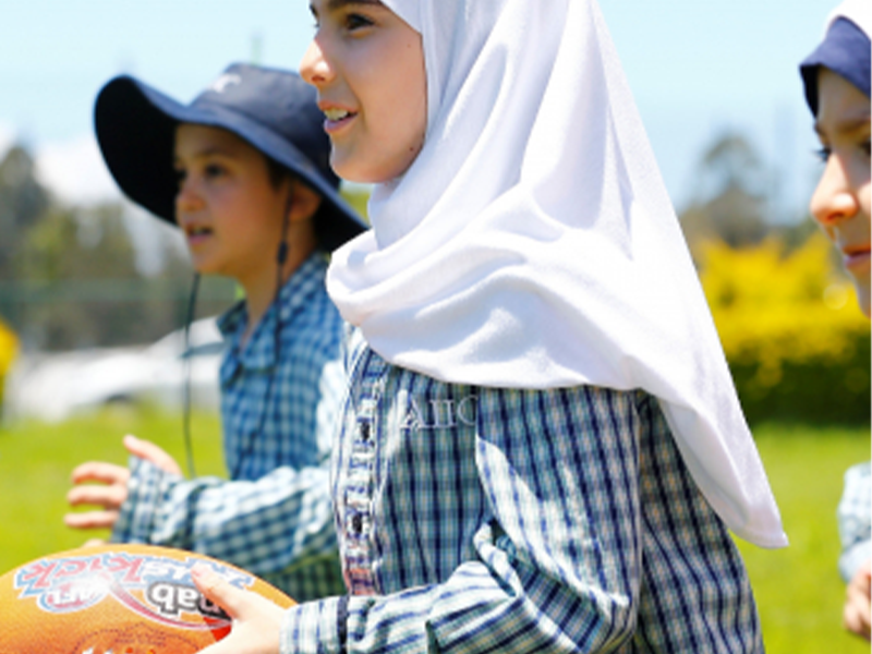 Settlement Council girls playing AFL