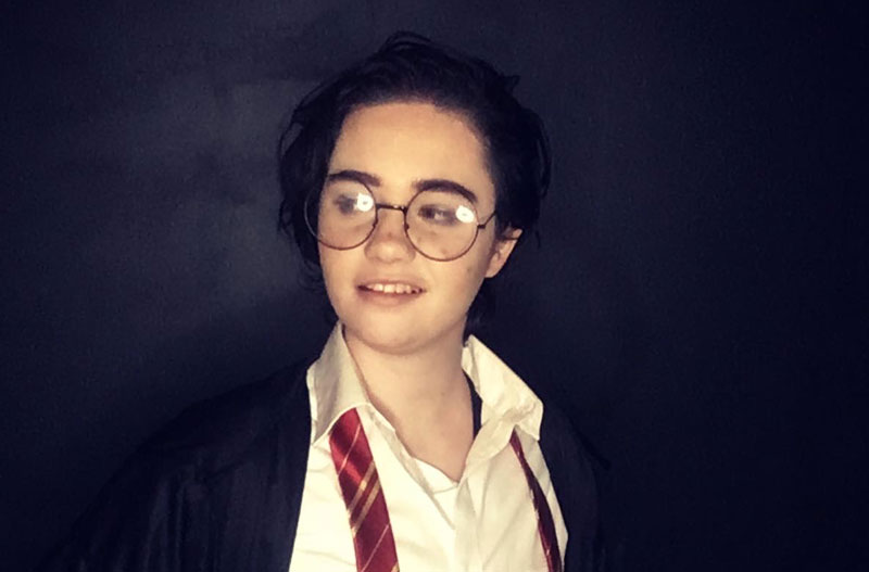 Photo of Sy dressed as Harry Potter